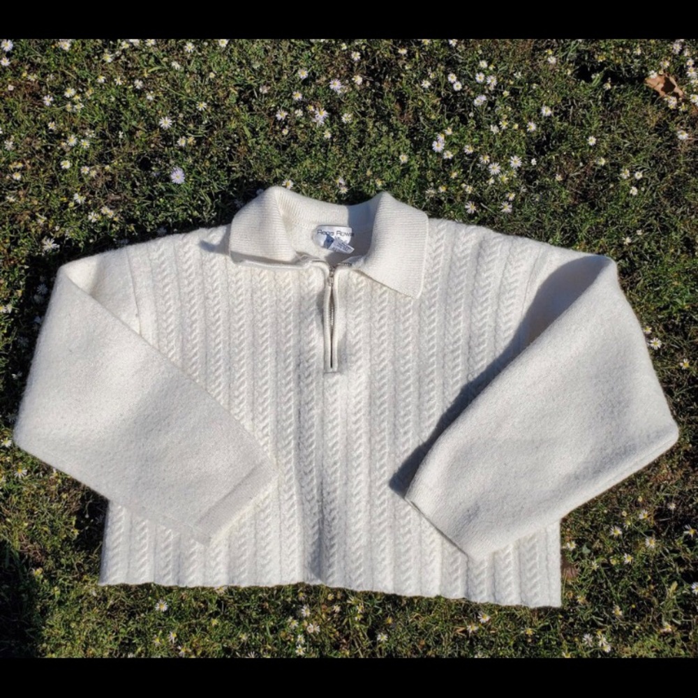 Cropped cable knit sweater